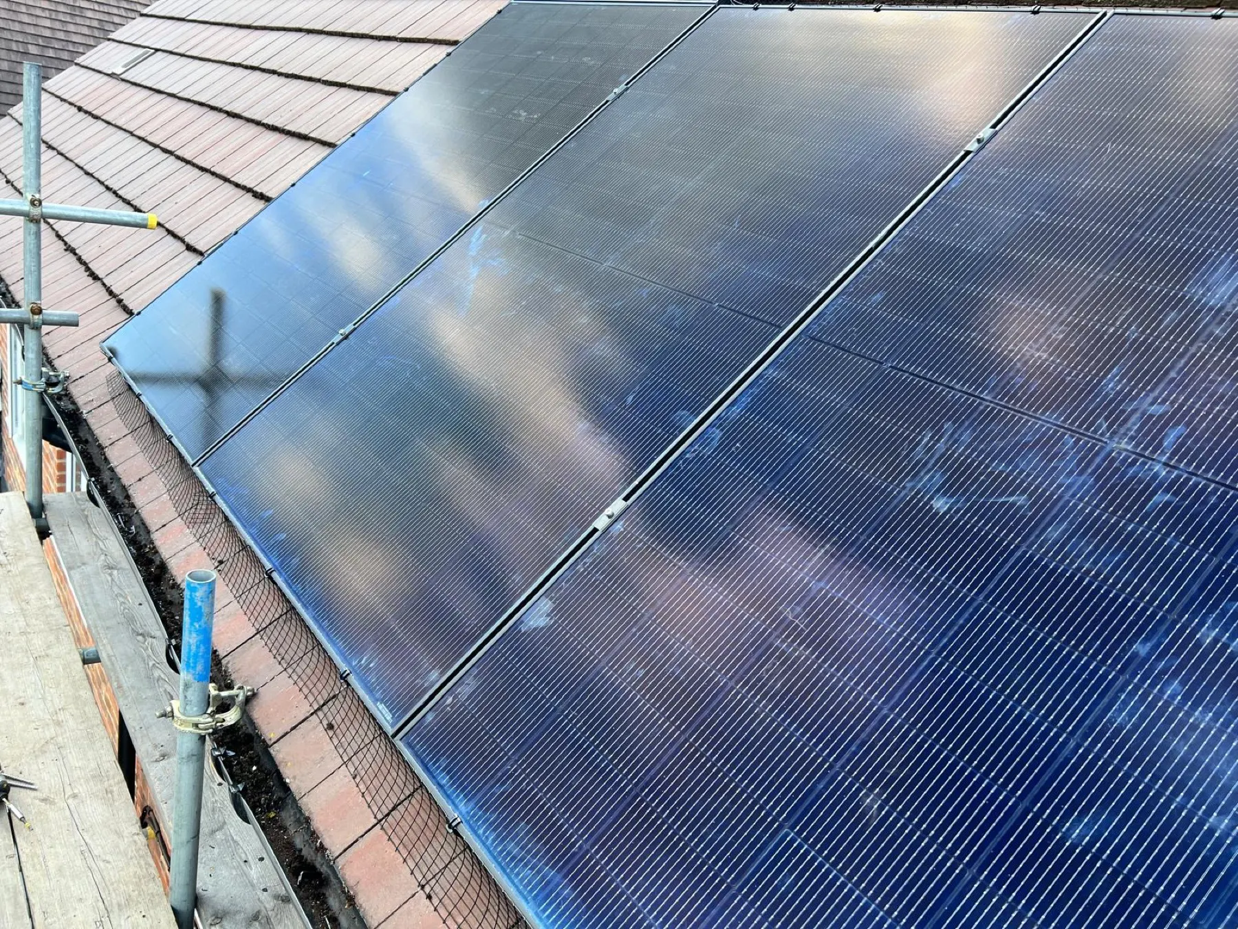 Solar panel installation on a roof in Woking, Surrey