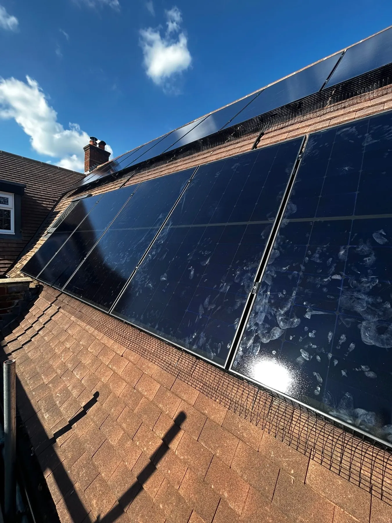 Solar panel installation on a roof in Epsom, Surrey